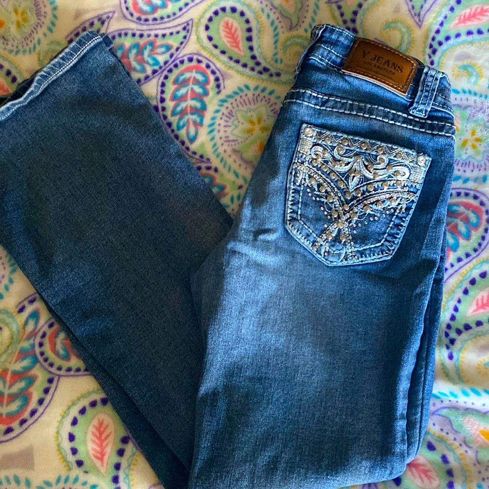 Brand Y size 1 flared jeans with rhinestones offer comfort, style, and glamour.
